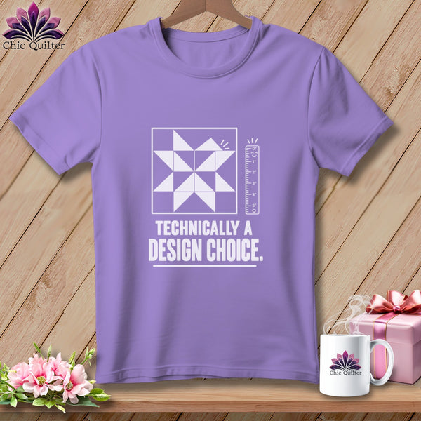 Lilac t-shirt with quilt block graphic and "Technically a Design Choice" text.