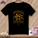 Black t-shirt featuring a yellow and black New Orleans Quilter graphic with a fleur-de-lis.