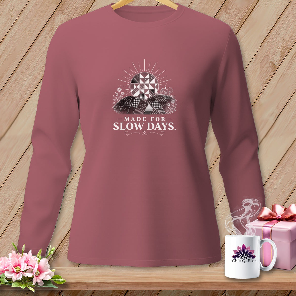 Long sleeve shirt with "Made for Slow Days" text and a quilt-like sun design.