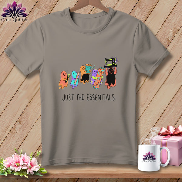 T-shirt with row of cartoon ghosts holding sewing notions, text "JUST THE ESSENTIALS."