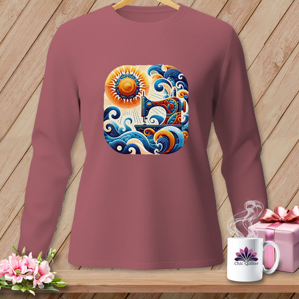 Long-sleeve shirt with a sewing machine, sun, and waves graphic.