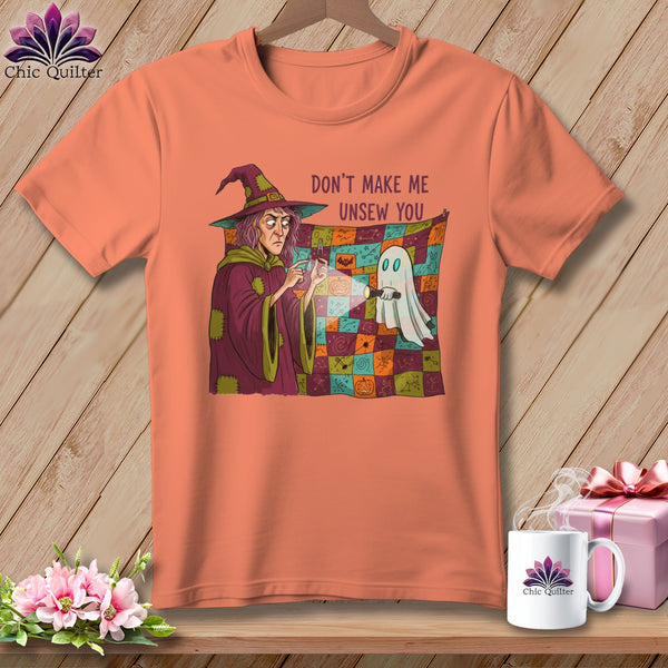 Peach t-shirt with witch and ghost design, text reads "DON'T MAKE ME UNSEW YOU".