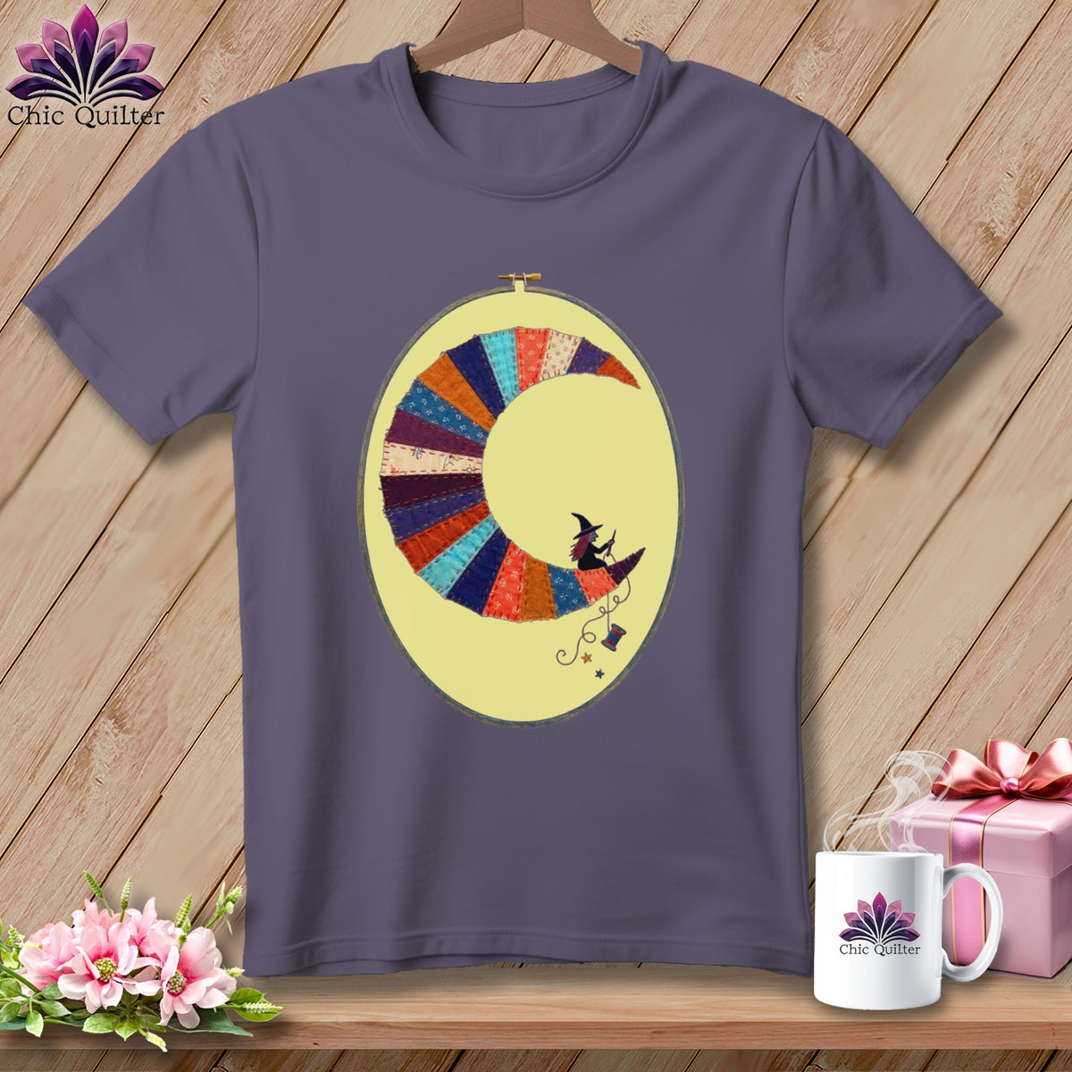 T-shirt with a crescent moon design featuring a witch and a spool of thread.