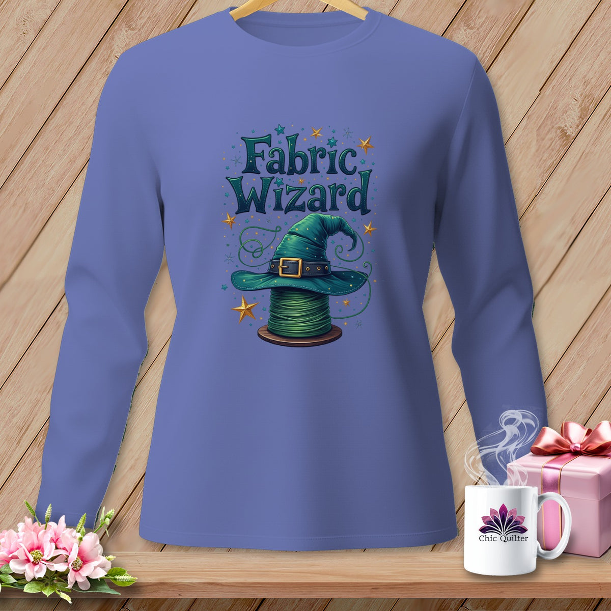 Long sleeve shirt with green wizard hat on a spool of thread design.