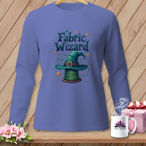 Long sleeve shirt with green wizard hat on a spool of thread design.