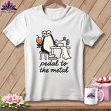 White t-shirt with a cartoon penguin sewing and the text 