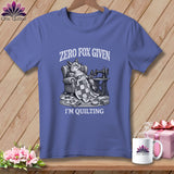 T-shirt with a fox sitting in a chair with a quilt, sewing machine, and text 