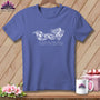 T-shirt with a graphic of a woman flying on a quilt and the text "If found far from fabric, return to the quilt shop".
