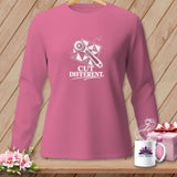 Pink long-sleeved shirt with white graphic of rotary cutter and 