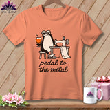 Peach t-shirt with penguin sewing and the text 