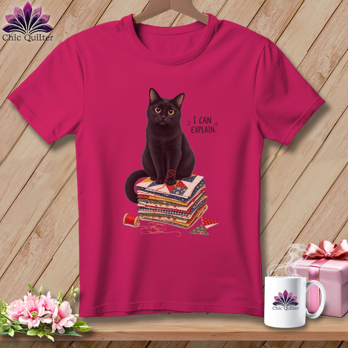 Black cat sitting on quilt squares with text "I CAN EXPLAIN."