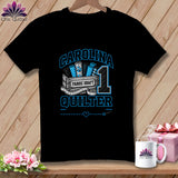 A black t-shirt features a blue and white quilting graphic with the text CAROLINA QUILTER and FABRIC DRAFT.