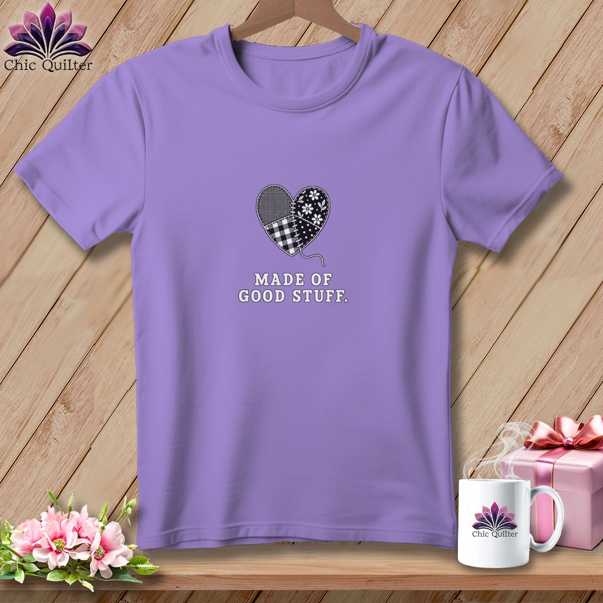 Lavender t-shirt with patchwork heart graphic and text "MADE OF GOOD STUFF."