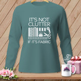 Teal long-sleeve shirt with white text 