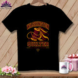 Black t-shirt featuring a spool of thread graphic, the text Washington Quilter, and a needle on a wooden background.
