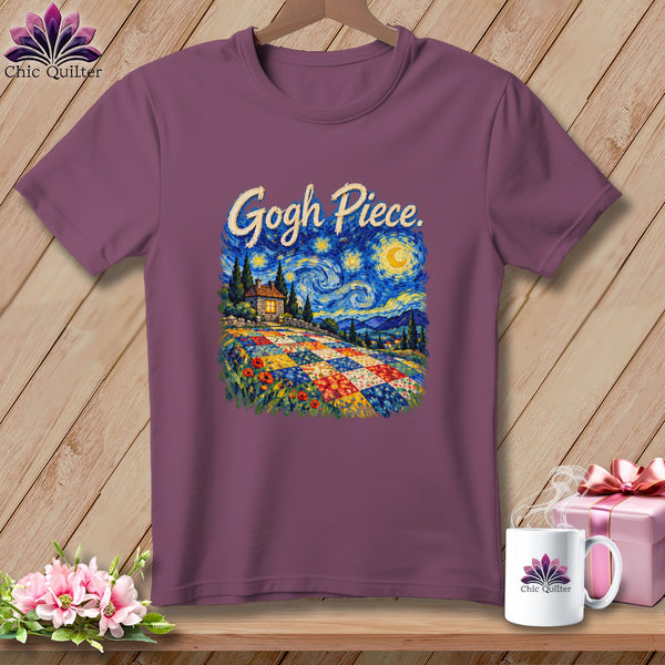 A purple t-shirt featuring a Starry Night graphic with a colorful quilt foreground and the text Gogh Piece.
