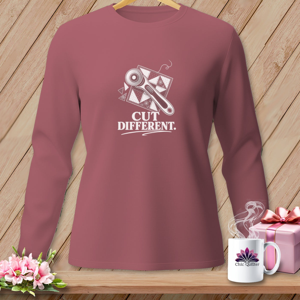Mauve long-sleeve shirt with "CUT DIFFERENT" and rotary cutter graphic.