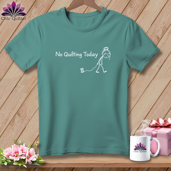 Teal t-shirt with "No Quilting Today" and a stick figure pulling a thread spool.
