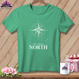Green t-shirt with white compass design and 