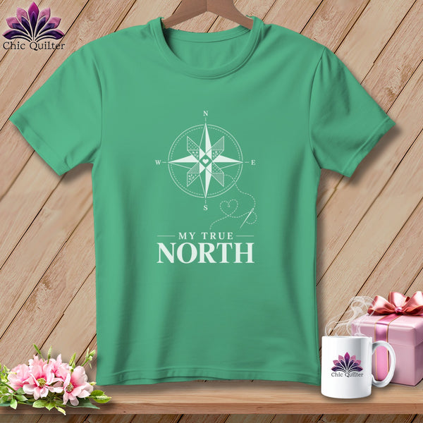 Green t-shirt with white compass design and "My True North" text.