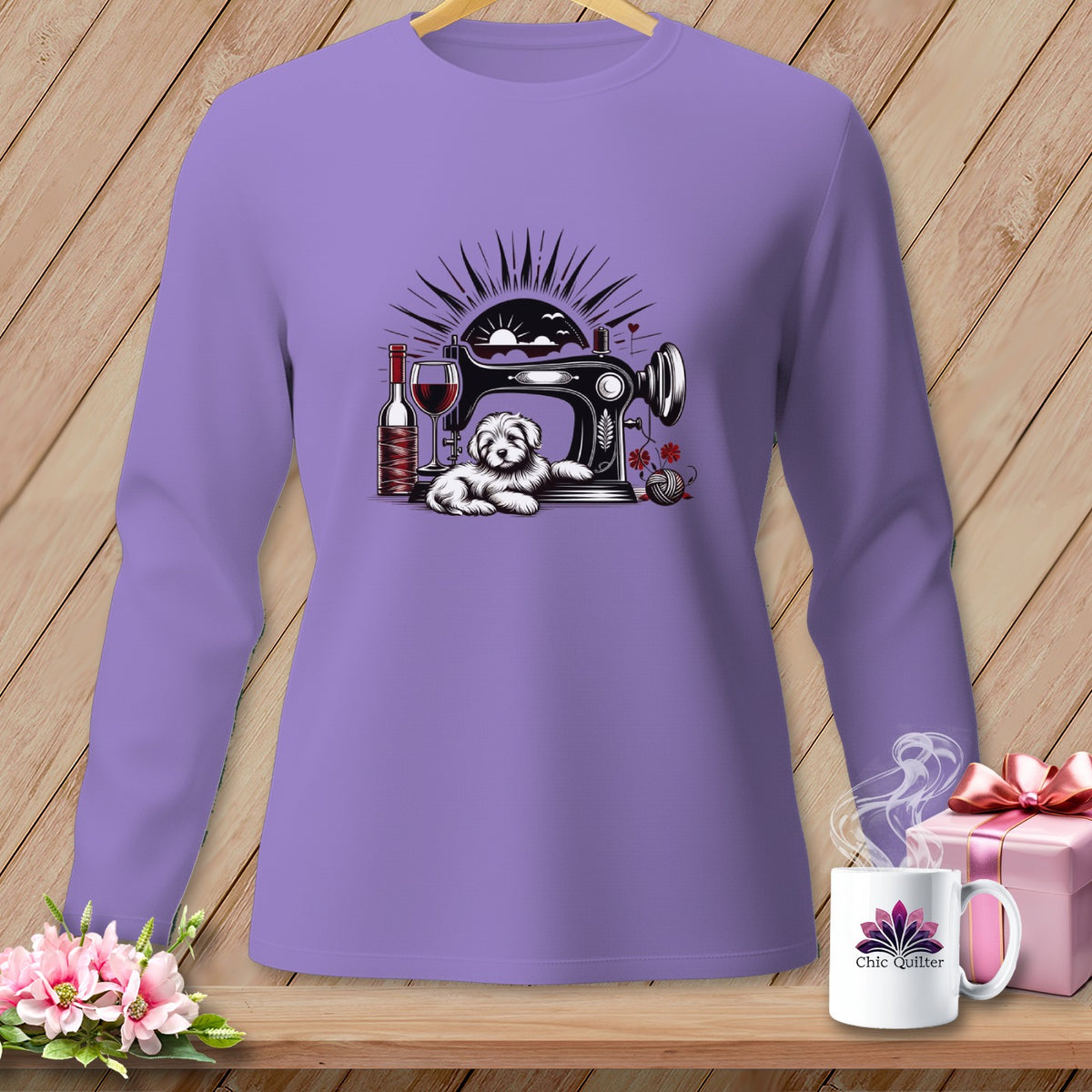 Purple long-sleeve shirt with a sewing machine, dog, wine, and yarn graphic.