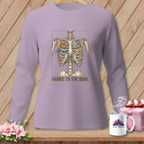 Long sleeve shirt with skeleton ribcage filled with fabric, reads 