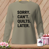Taupe long-sleeve shirt with black text reading 