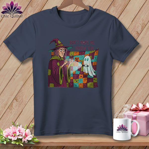 Dark blue t-shirt with a witch and ghost graphic, text reads "Don't Make Me Unsew You."