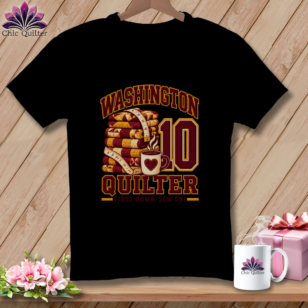 Black t-shirt featuring a stack of quilts, a coffee mug, and text reading WASHINGTON QUILTER.