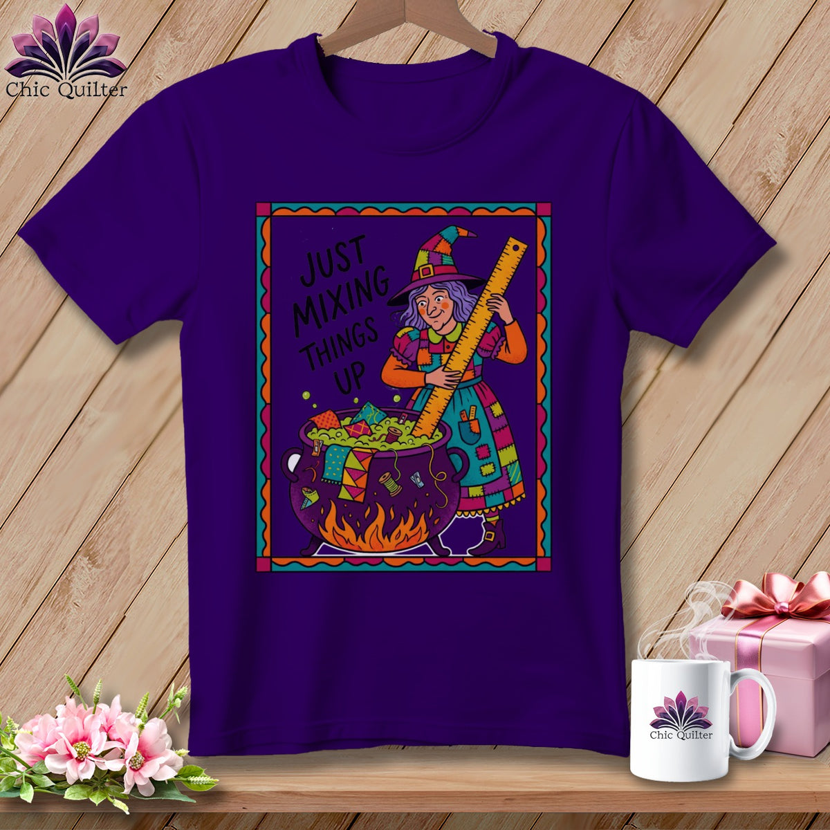 Purple t-shirt with "Just Mixing Things Up" witch sewing design.