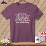 T-shirt with three cartoon bats holding wine glasses, saying 