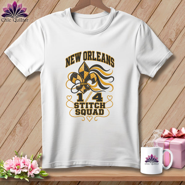 A white t-shirt features New Orleans 1/4 Stitch Squad graphics on a wooden background.
