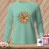 Light teal long-sleeve shirt with a circular quilting and sewing motif.