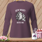 A long-sleeved purple shirt featuring a hedgehog graphic with the text Sew What? Bite Me.
