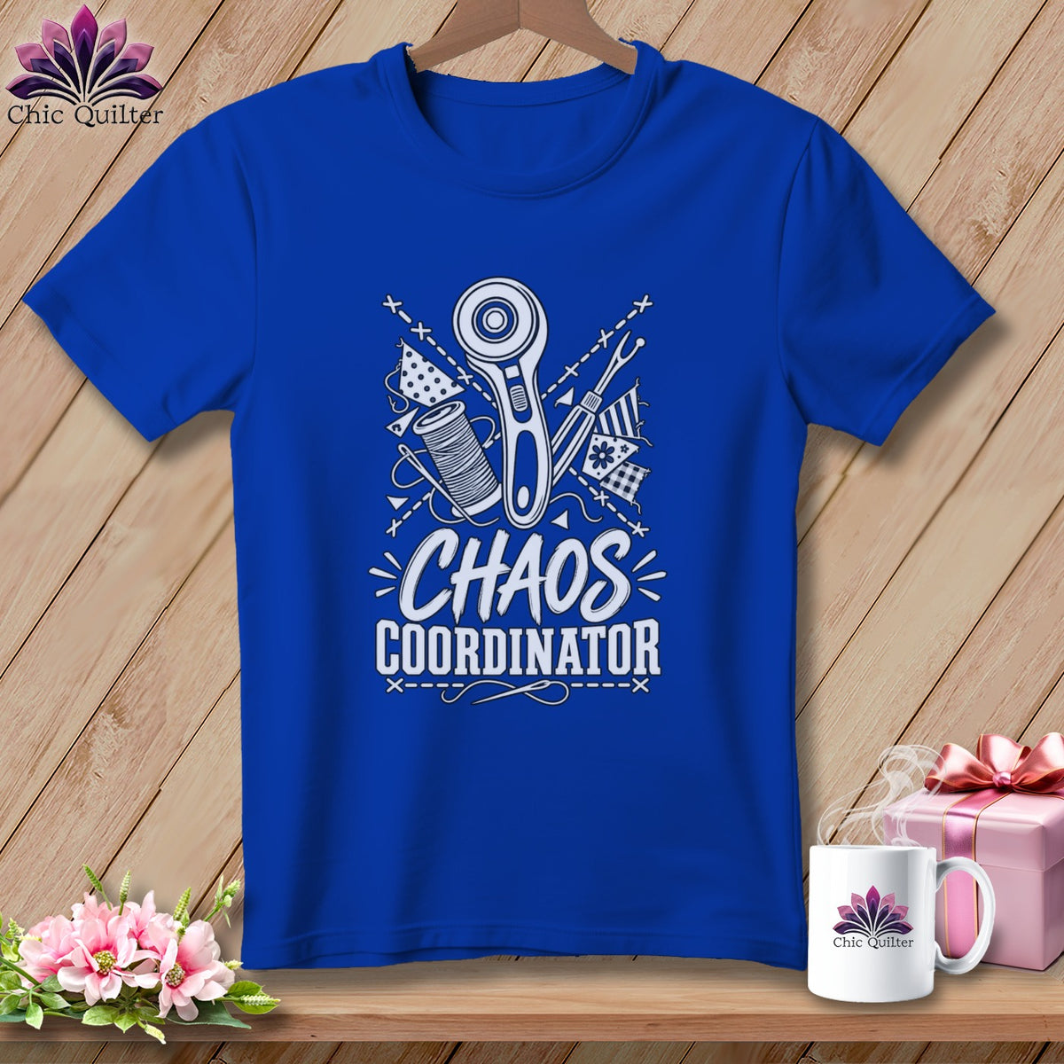 Blue t-shirt with sewing tools and "Chaos Coordinator" text.