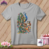 Gray t-shirt with a vibrant peacock design surrounded by quilting materials and a sewing machine.