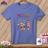 Periwinkle t-shirt featuring a colorful graphic of four whimsical cartoon birds and text reading 