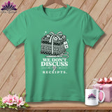 Green t-shirt with fabric stack, scissors, and text 