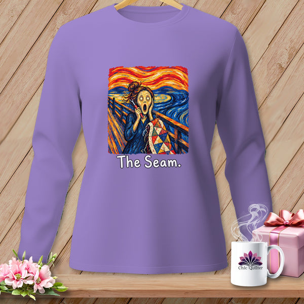 Purple long-sleeve shirt with The Scream painting featuring a quilt and text "The Seam."