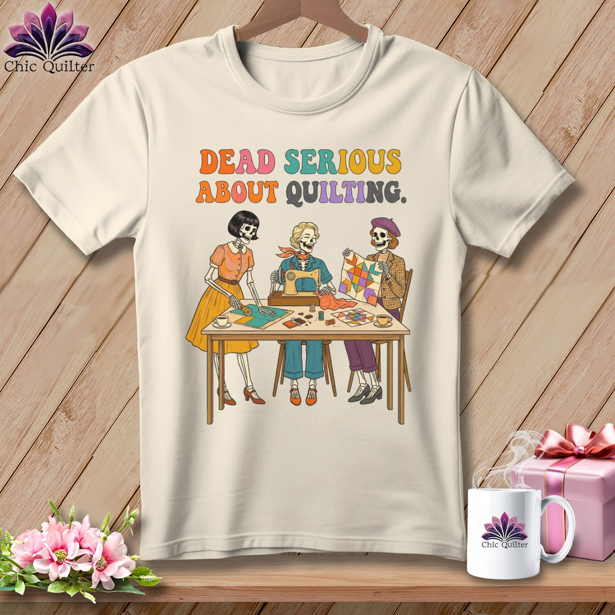 Shirt with skeletons sewing and quilting, text reads "Dead Serious About Quilting."