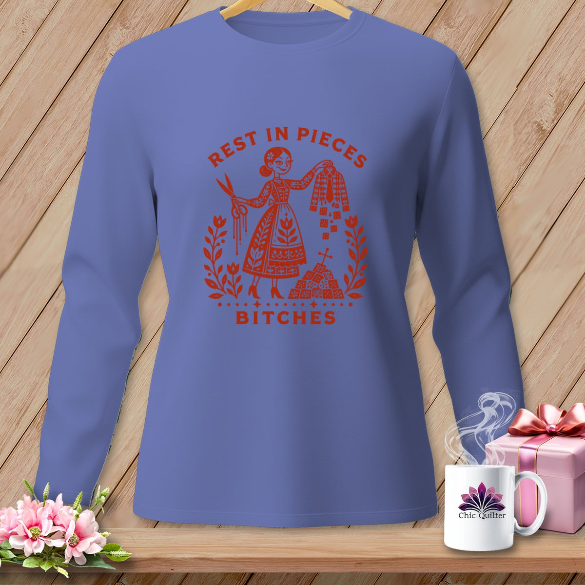 Purple long-sleeve shirt with red graphic: "Rest in Pieces Bitches"