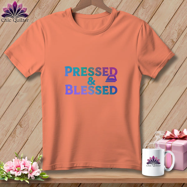 Peach t-shirt with "PRESSED & Blessed" text and an iron graphic.