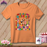 An orange t-shirt displays a graphic of cartoon farm animals behind a colorful quilt, with the text Did Somebody Say Quilt Show.
