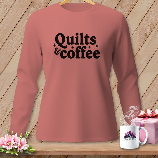Pink long-sleeve shirt with "Quilts & coffee" text and decorative stars.