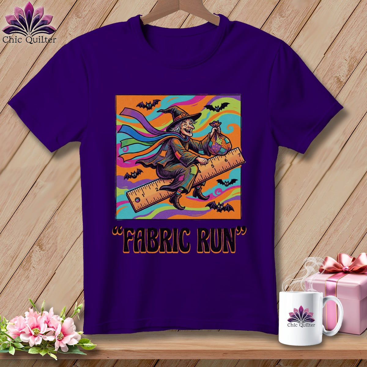 Purple t-shirt with a cartoon witch flying on a ruler, text reads "FABRIC RUN".