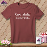 Maroon t-shirt with white text 