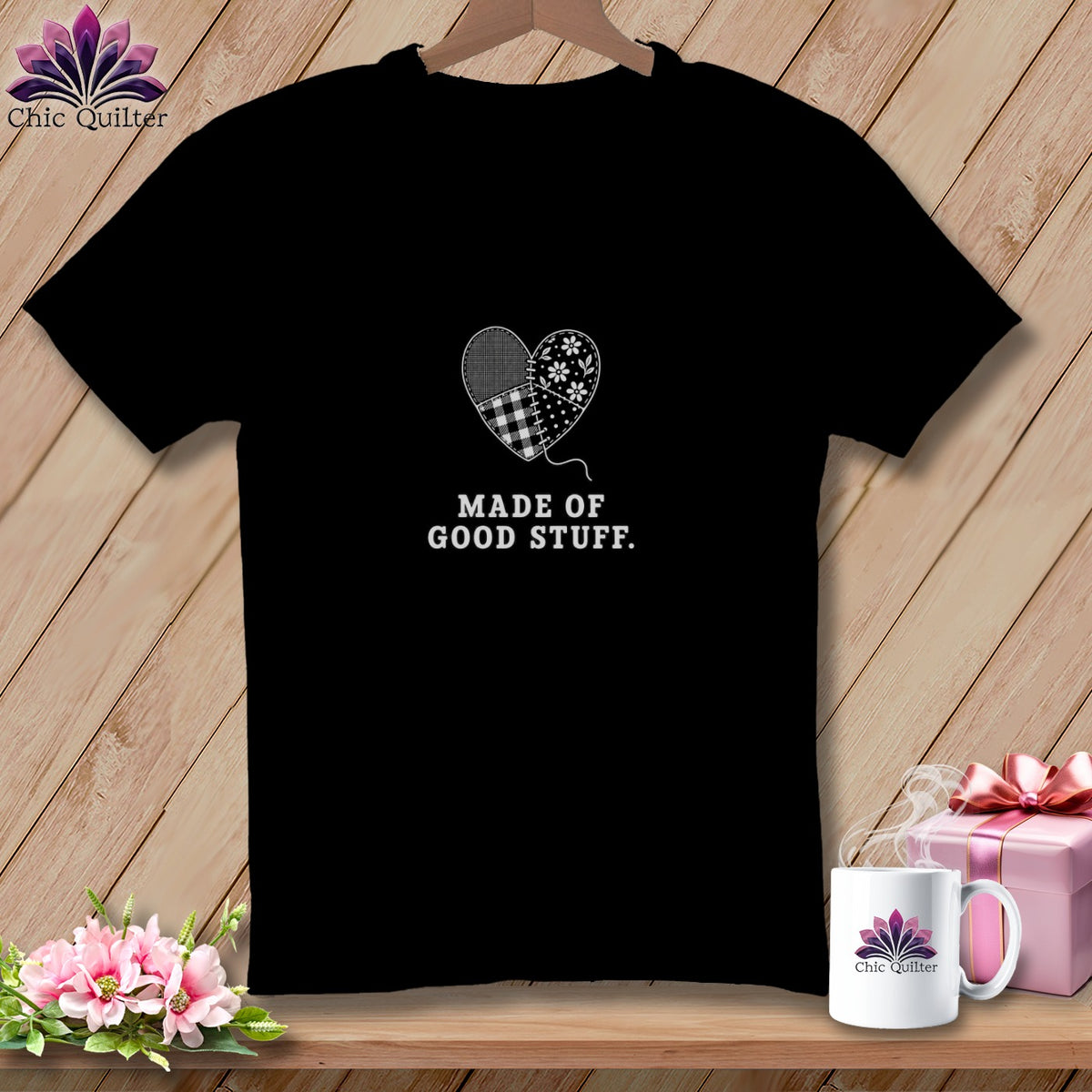 Black t-shirt with patchwork heart graphic and text "MADE OF GOOD STUFF."