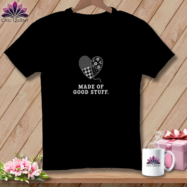 Black t-shirt with patchwork heart graphic and text "MADE OF GOOD STUFF."