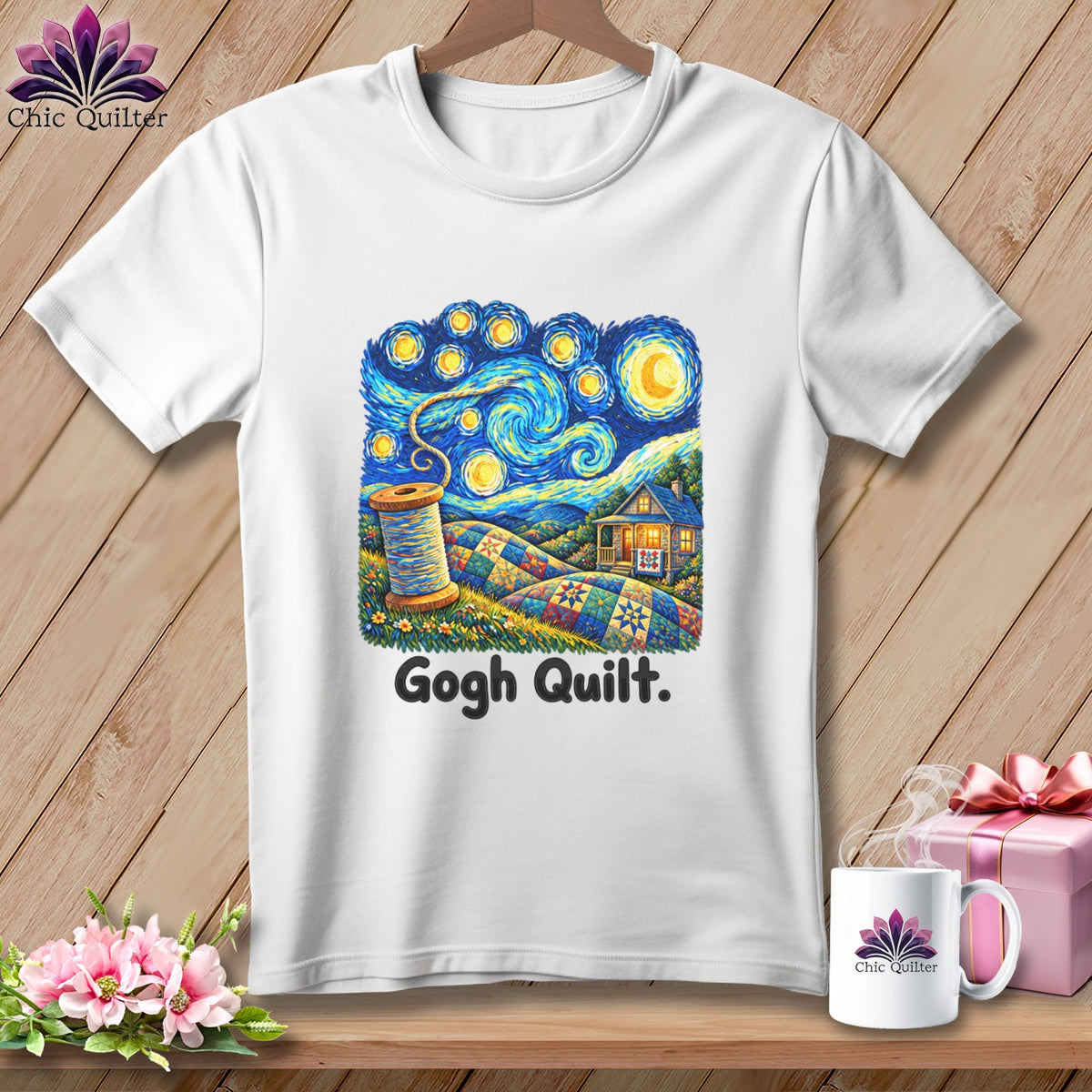 White t-shirt featuring a quilt scene under a starry sky with text "Gogh Quilt.".