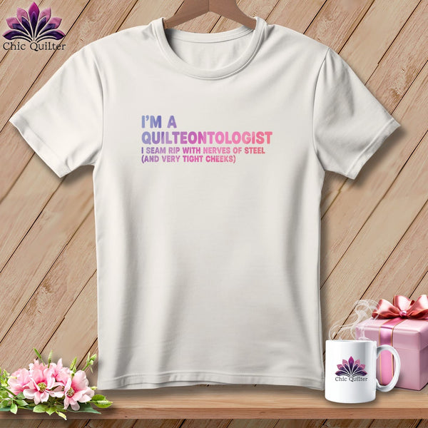 White t-shirt with "I'm a Quilteontologist" and humorous text.